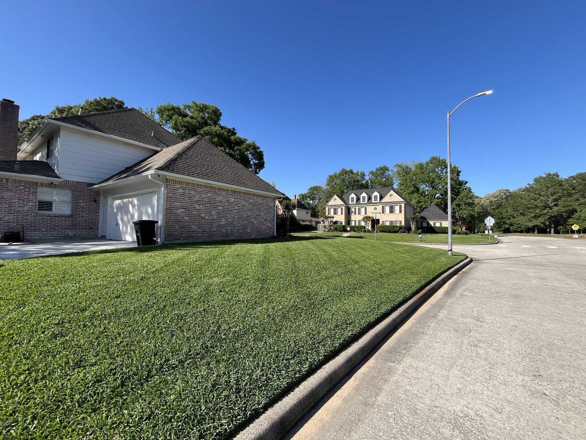 Freshly mowed striped lawn Houston TX